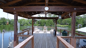 Still frame of a pier and covered area.