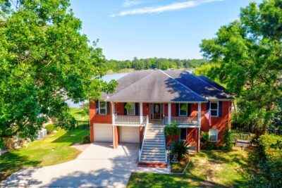 Aerial Property Photo of House on Water